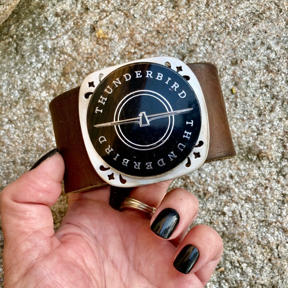 Leather cuff, car emblem